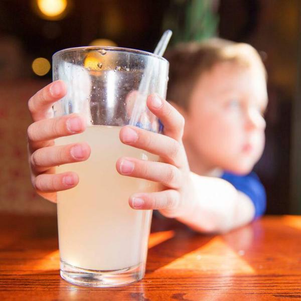 st. louis boy drinking lemonade